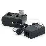 WRINEX chargeur pour b atterie NP-BX1 SONY vue de côté droit avec batterie en charge et adaptateur mural